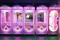 Ρόδινη ημερομηνίας μηχανή γερανών παιχνιδιών νυχιών Arcade χρησιμοποιημένη νόμισμα